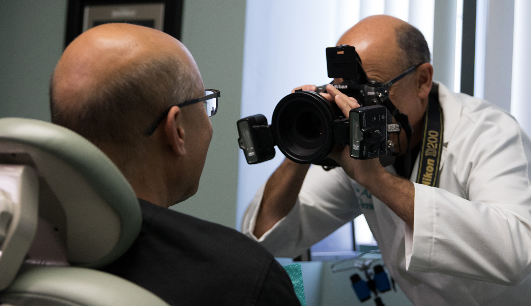 Photo of doctor taking picture of patient